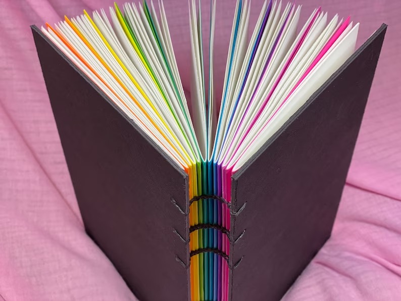 a photo of a handbound rainbow journal