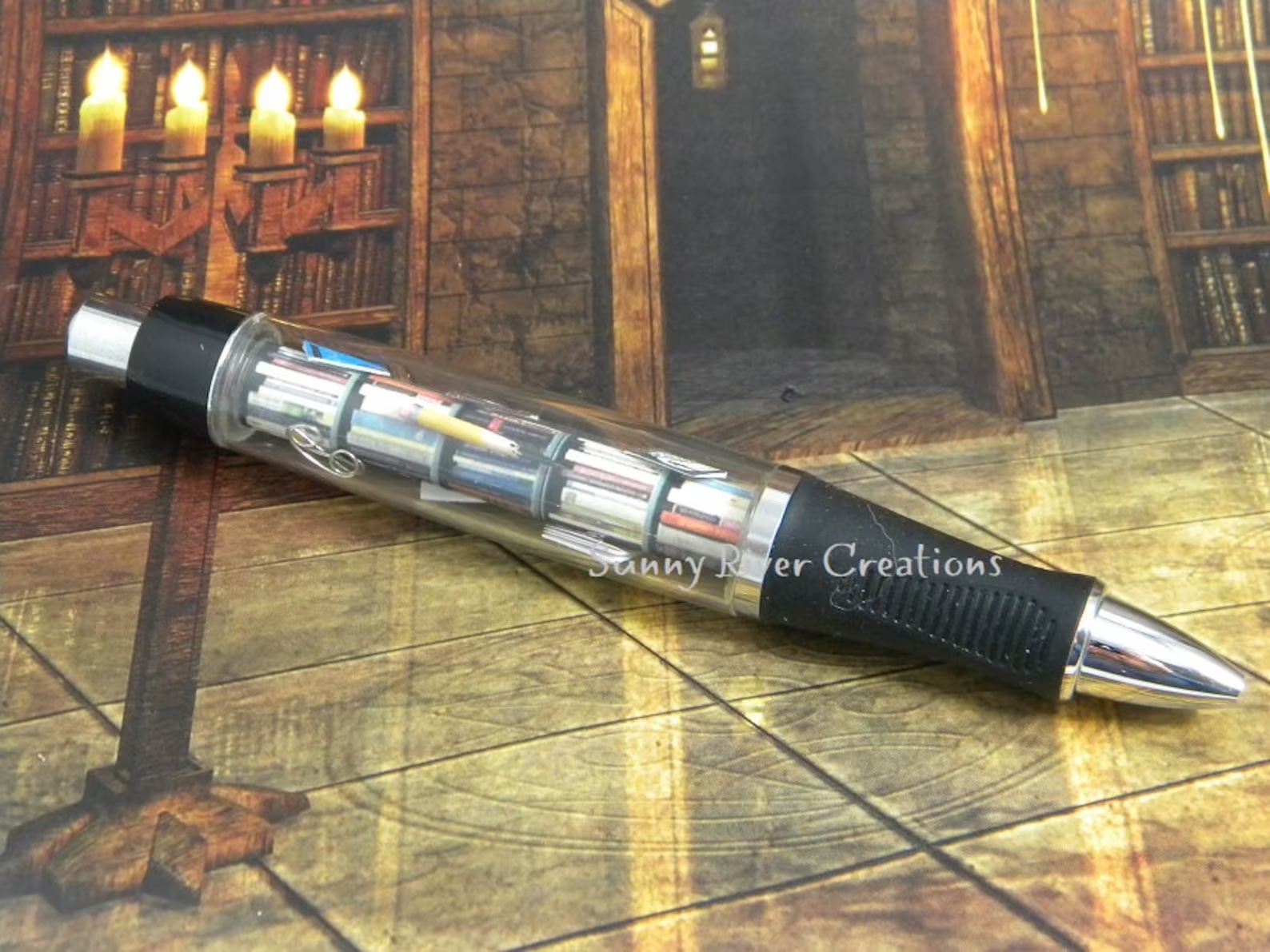 a photo of a clear pen with books inside