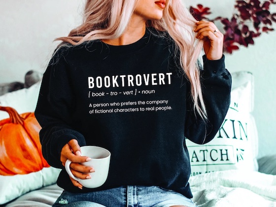 a photo of a black sweatshirt that says booktrovert