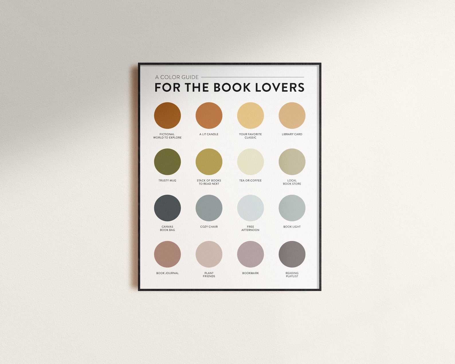 a photo of an art print with the words "for the book lovers" at the top. There are twelve different colored circles formatted into a four by four grid. Each color has a quirky bookish name.