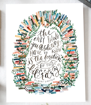 art print of water color books in circle with a quote by Albert Einstein that says the only thing you absolutely have to know is the location of the library