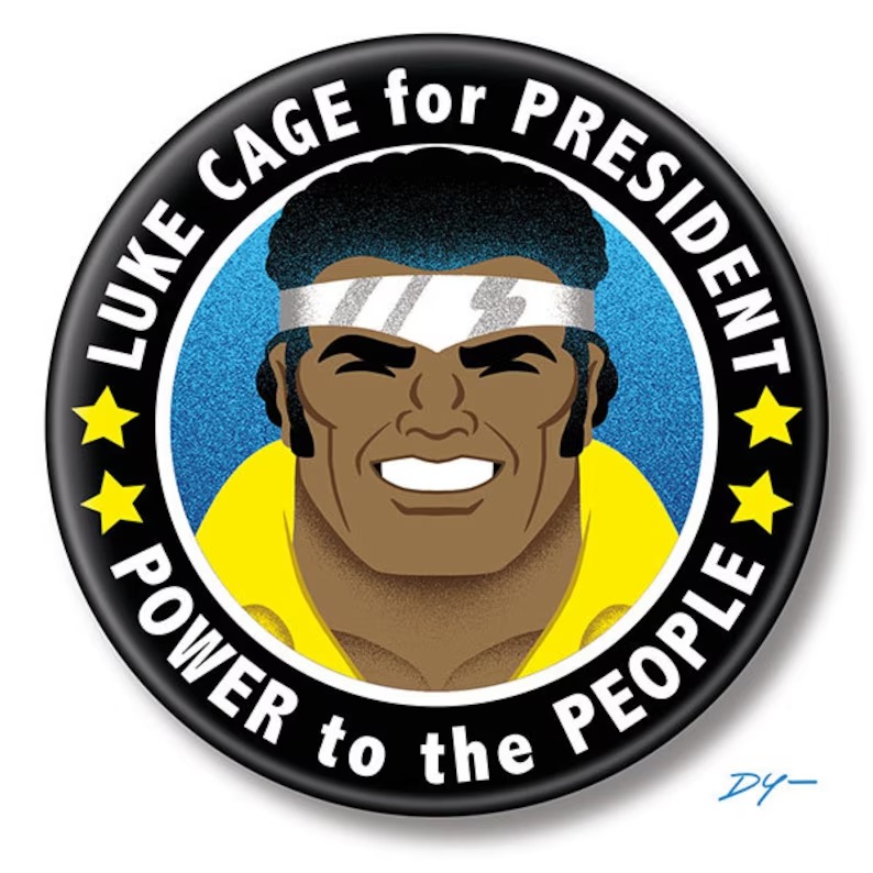 A fake campaign button featuring a smiling Luke Cage and the slogan "power to the people"