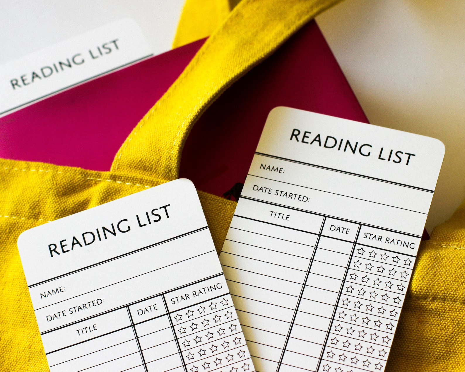 a bookmark that features lines for readers to create reading lists right on the bookmark