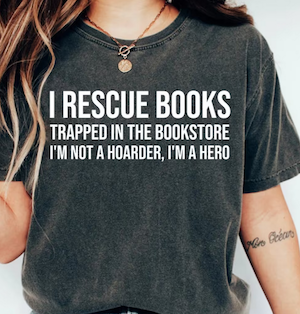tshirt that says I rescue books trapped in the bookstore I'm not a hoarder I'm a hero