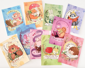 variety of postcards with illustrations of animals reading books