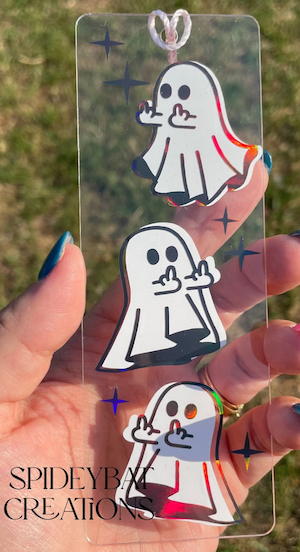 clear bookmark with 3 white ghosts in center all giving the finger