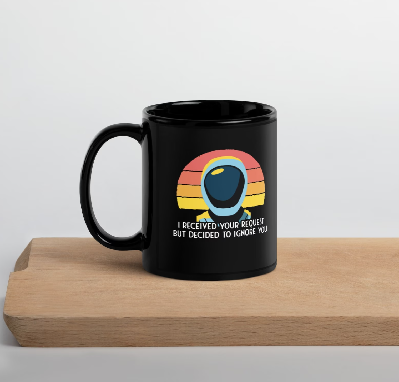Black Murderbot Mug with an illustration of Murderbot in front of a circular color block sunset and the caption "I received your request but decided to ignore you" in white.