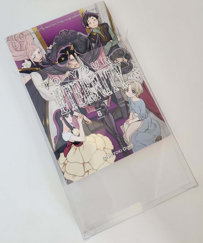 A manga volume sticking half-out of a plastic protector
