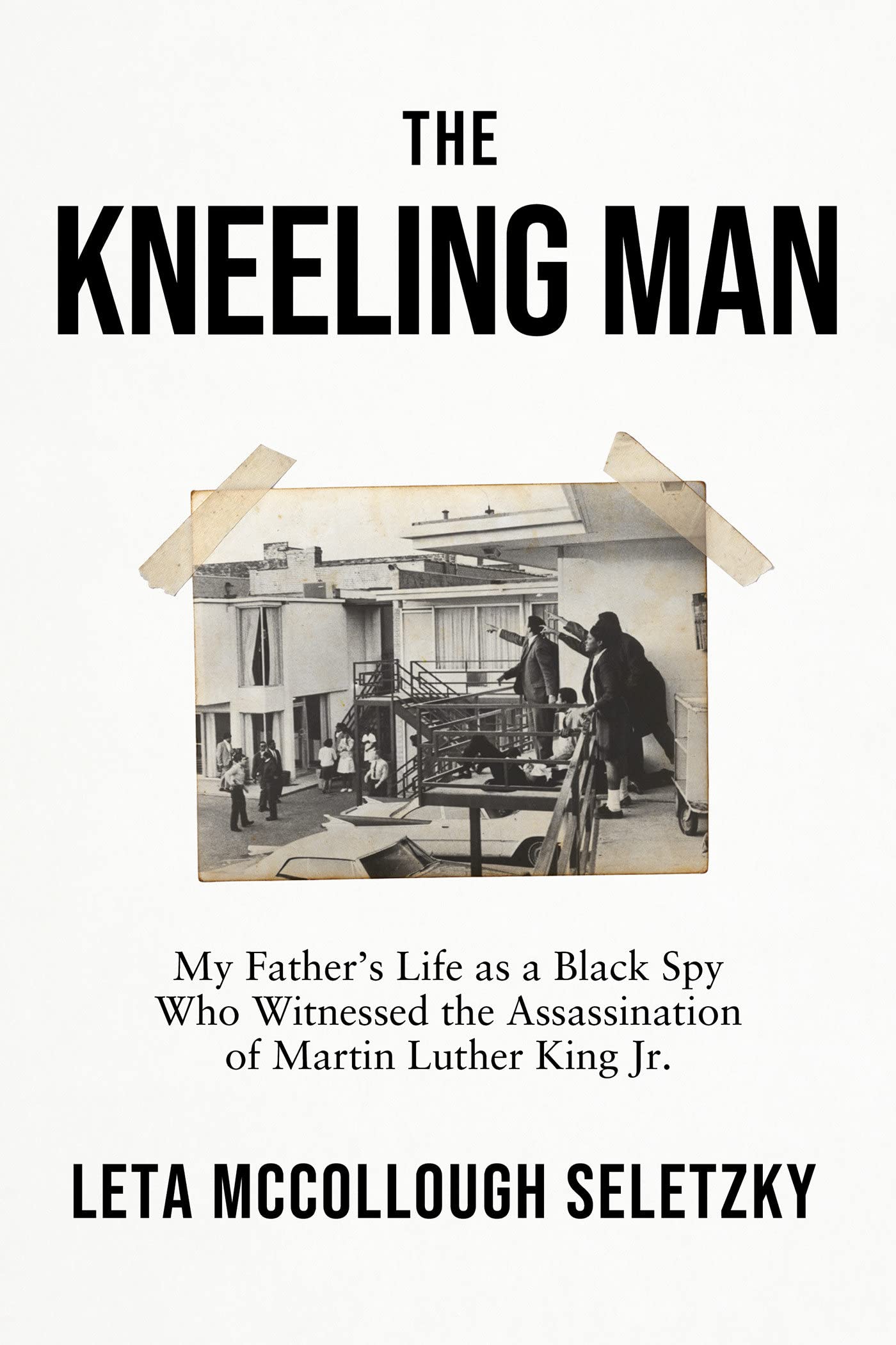 cover of The Kneeling Man: My Fathers Life as a Black Spy Who Witnessed the Assassination of Martin Luther King Jr.
