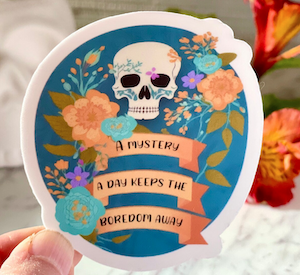 a graphic designed sticker with a skull and banners that say "a mystery a day keeps the boredom away"
