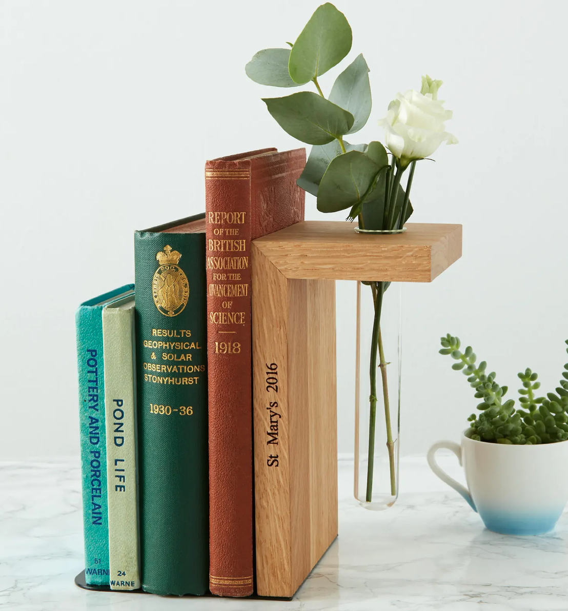 Wooden bookend with vase