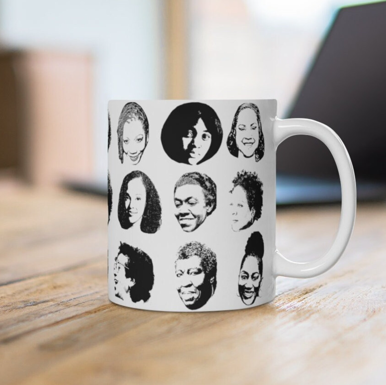 White mug with black and white images of famous Black women writers