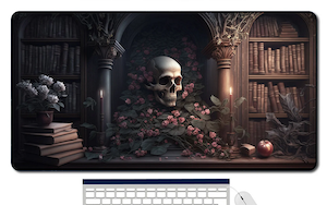 a deskmat with a graphic image of a skull and flowers surrounded by stacks of books