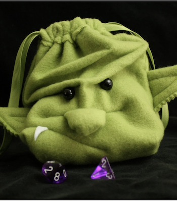 a photo of a felt dice bag in the shape of a goblin's head