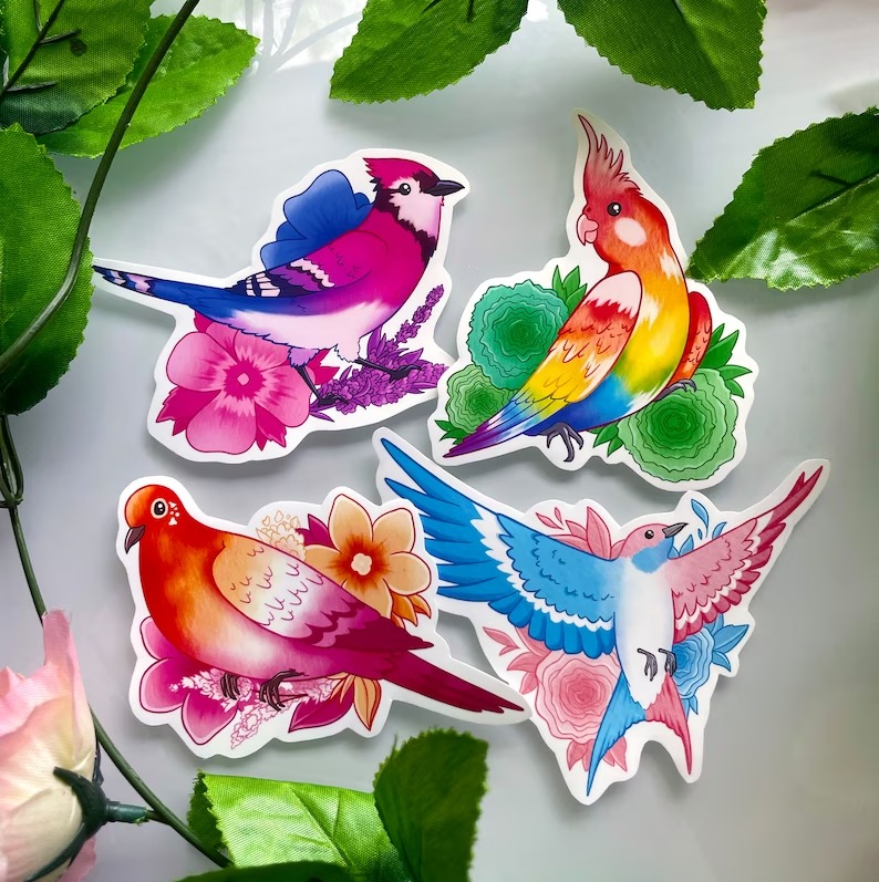 a set of bird stickers in pride flag colors