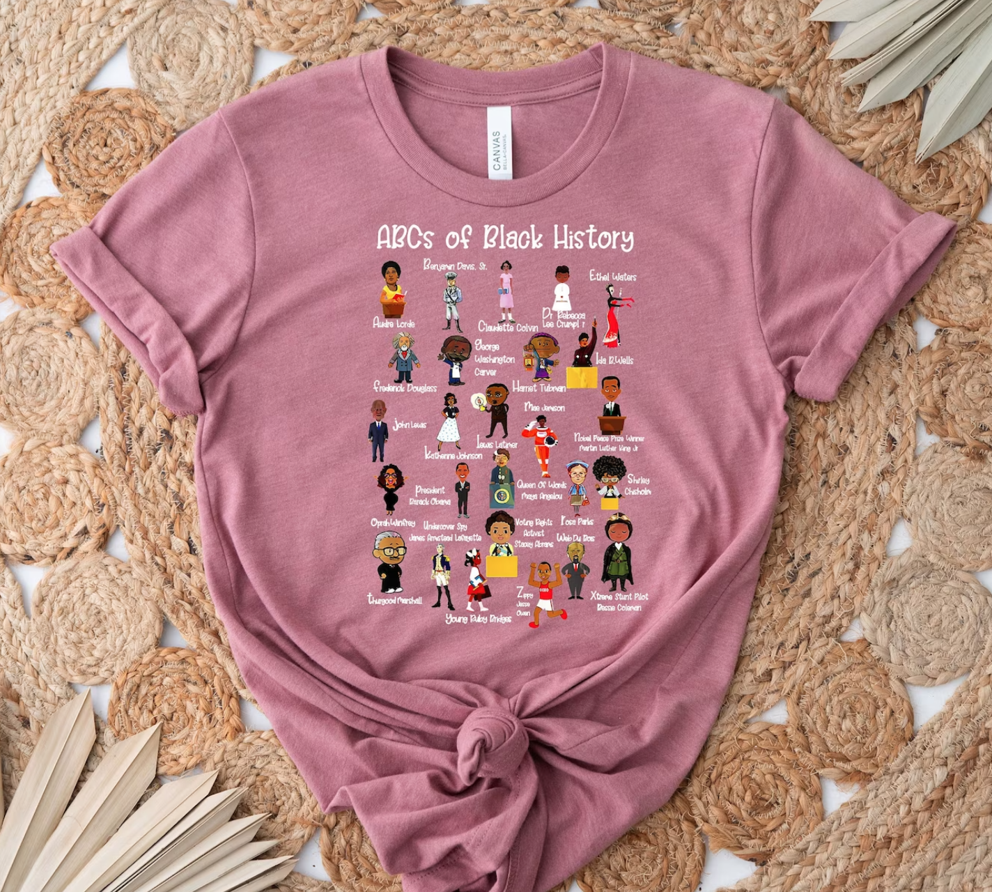 Pink Tee with figures corresponding to Black History