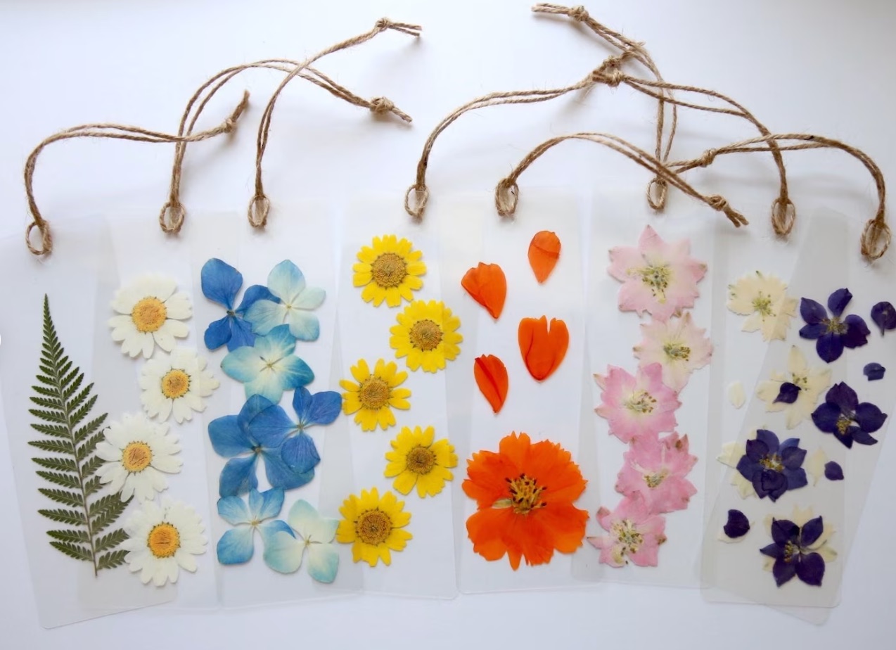 dried pressed flower bookmarks in a rainbow of flower colors