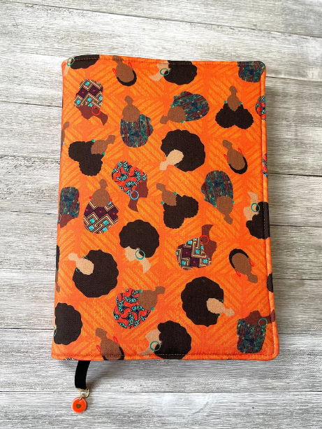 Afros and Headwraps Orange Book Cover