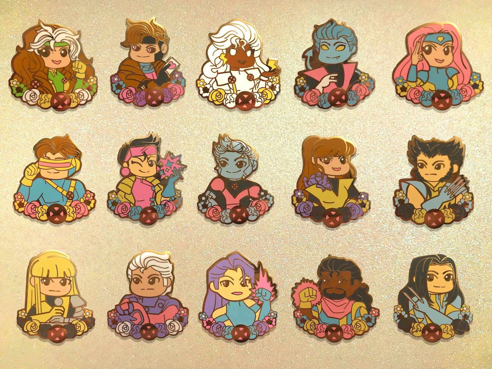 Fifteen enamel pins, each showing a chibi version of one of the X-Men