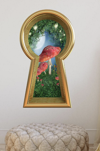 a photo of a Keyhole Wall Decal showing a fantasy world with mushrooms through the keyhole