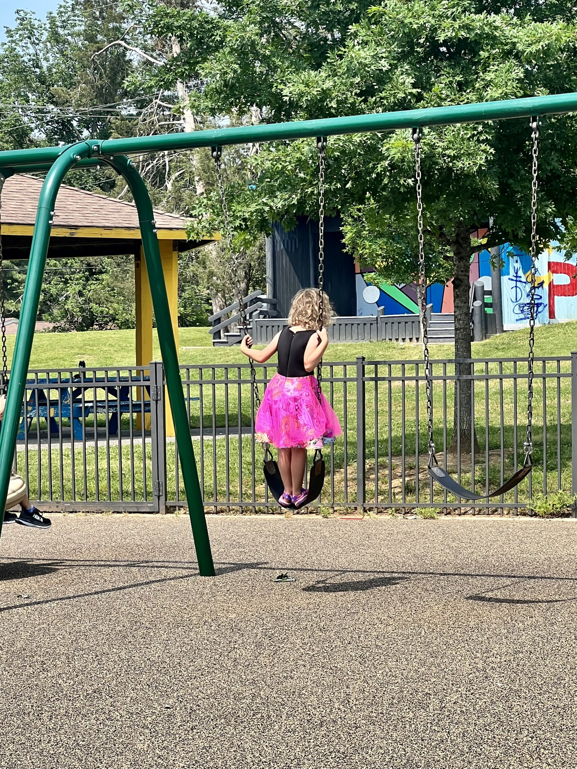 Marian standing in swing, The Kids Are All Right