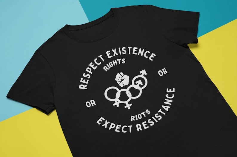 a black t-shirt with linked lesbian and gay men symbols linked below a fist and the text Respect Existence or Expect Resistance, Rights or Riots