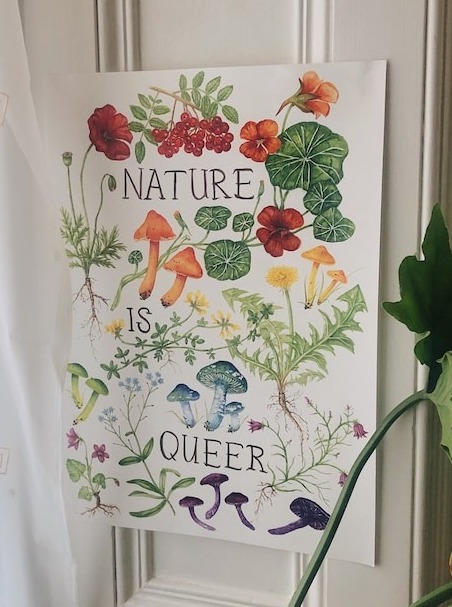 an art print with plants in rainbow colors and the text Nature is Queer