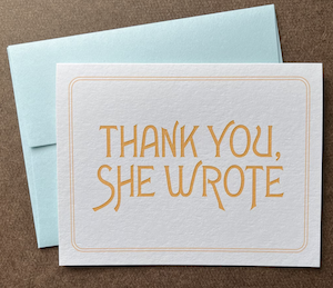 a greeting card that says "thank you, she wrote" on the front