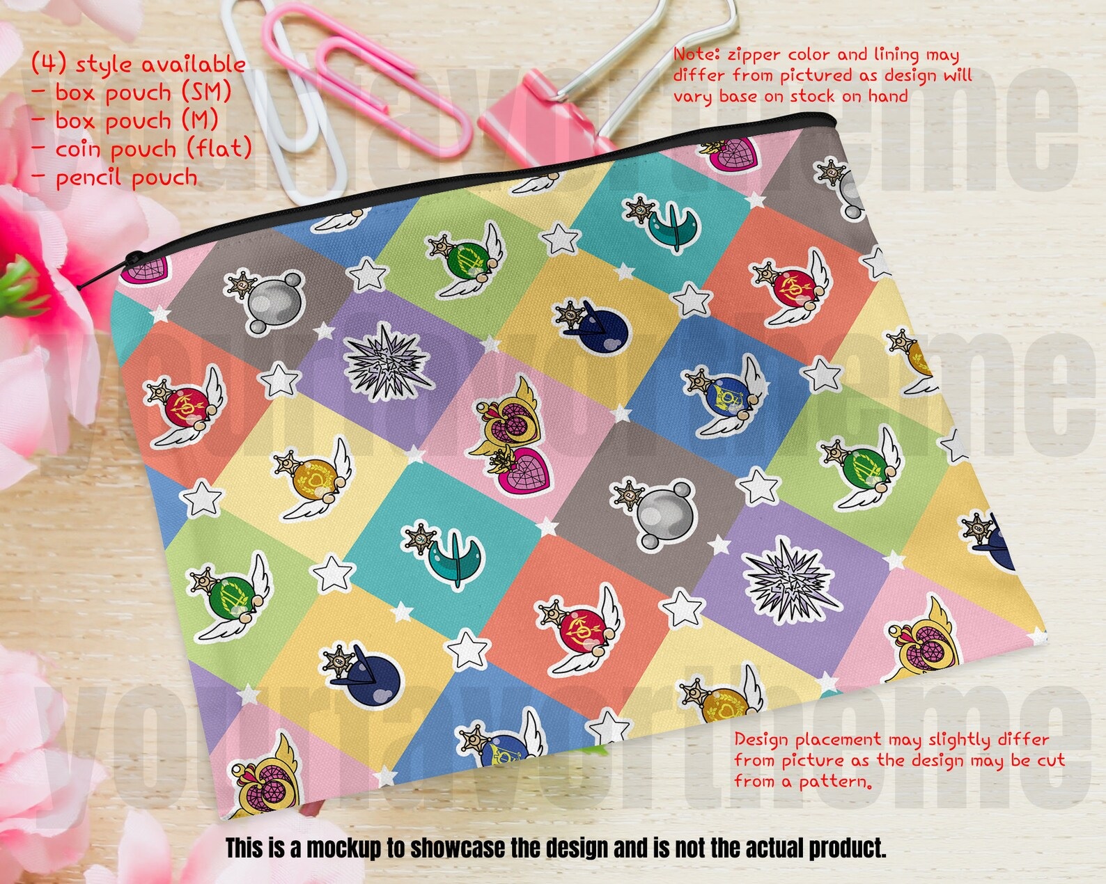 A coin purse with little hearts, moons, and other designs patterned on it