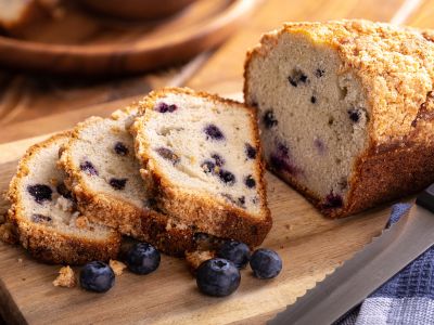blueberry loaf with some slices cut 
