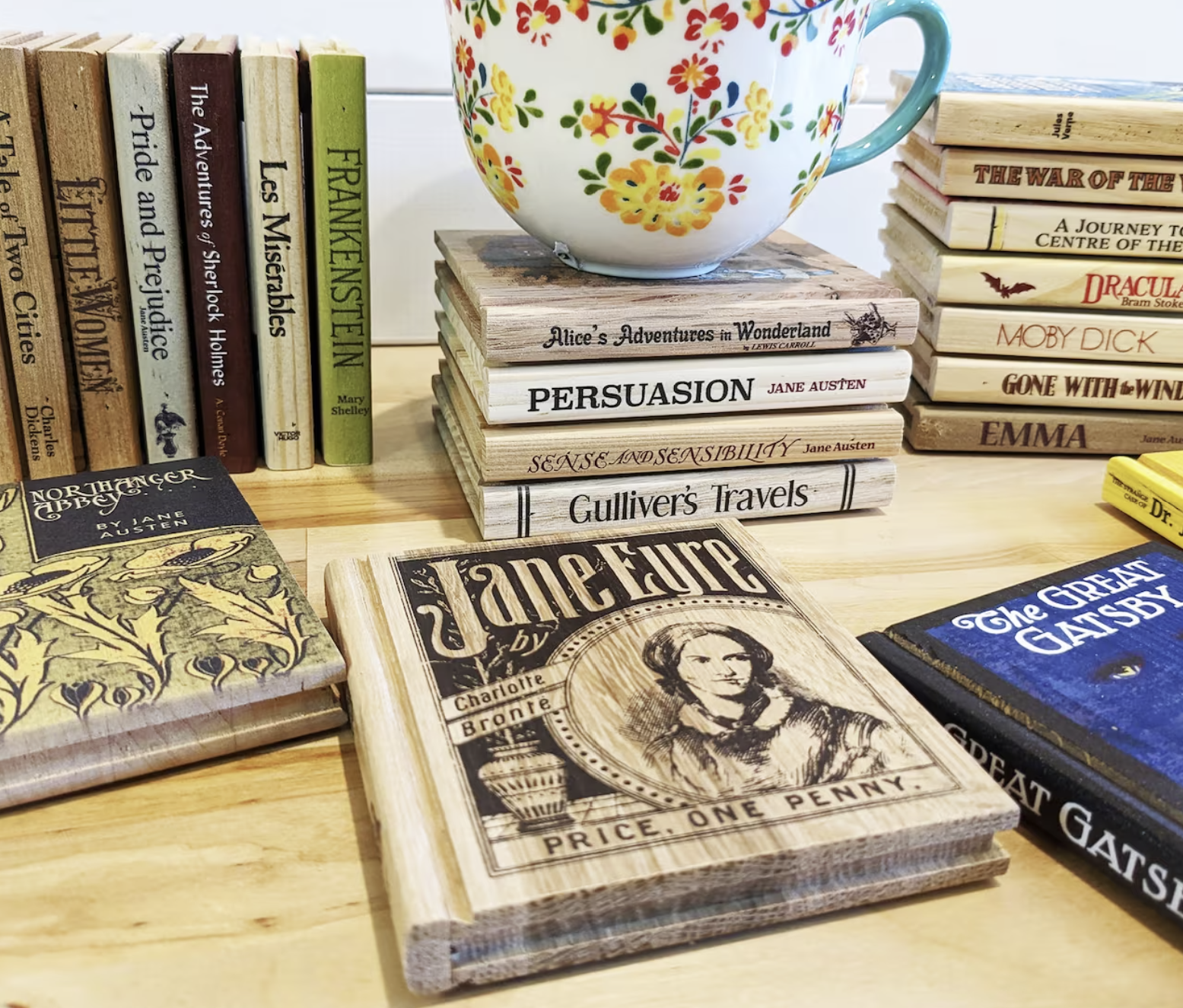Wooden Coasters carved and printed to look like book covers such as Jane Eyre.