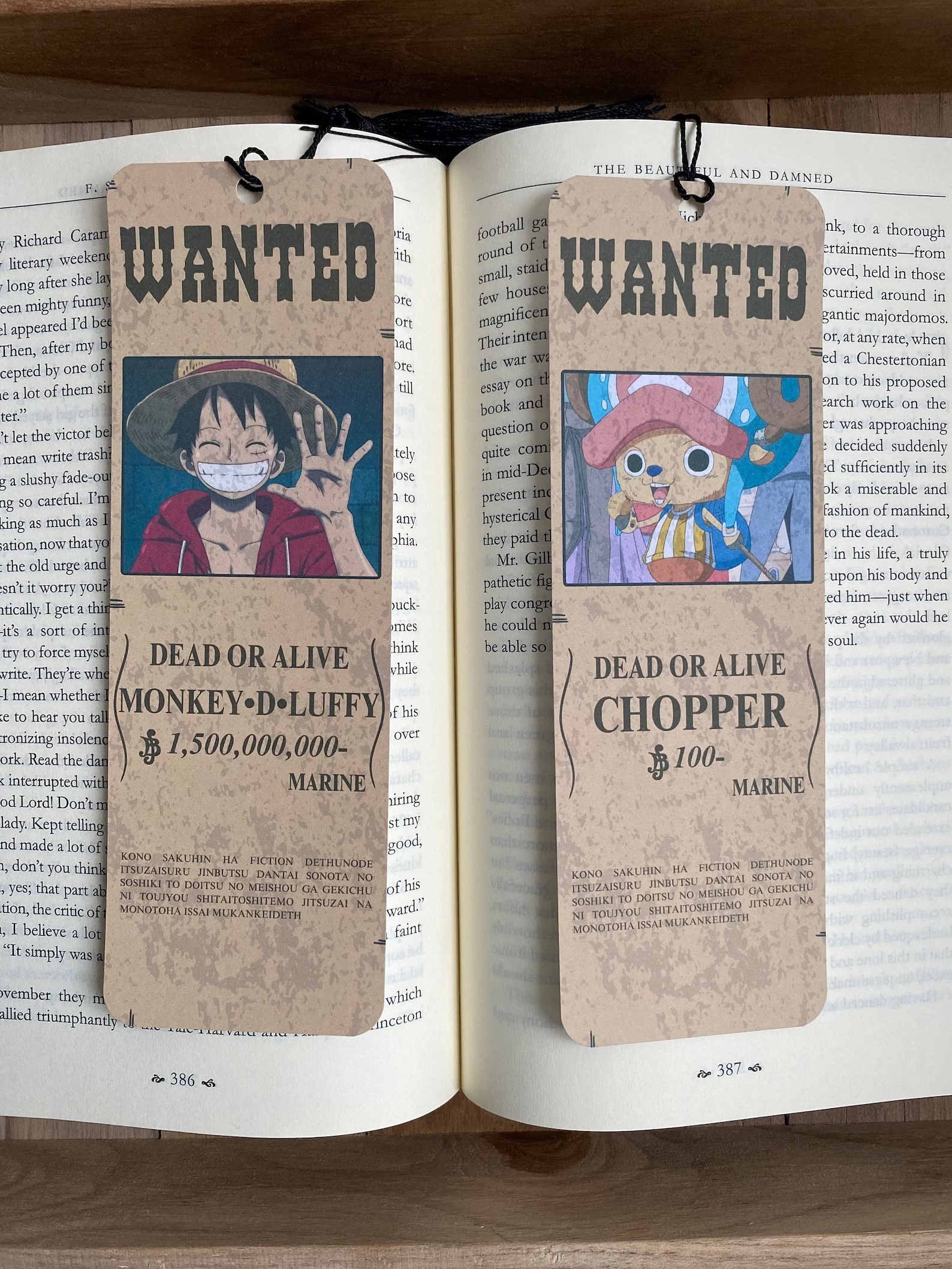 Two bookmarks featuring wanted posters for the characters from One Piece