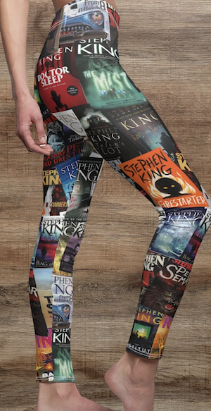 a pair of leggings with Sephen King book covers as the print