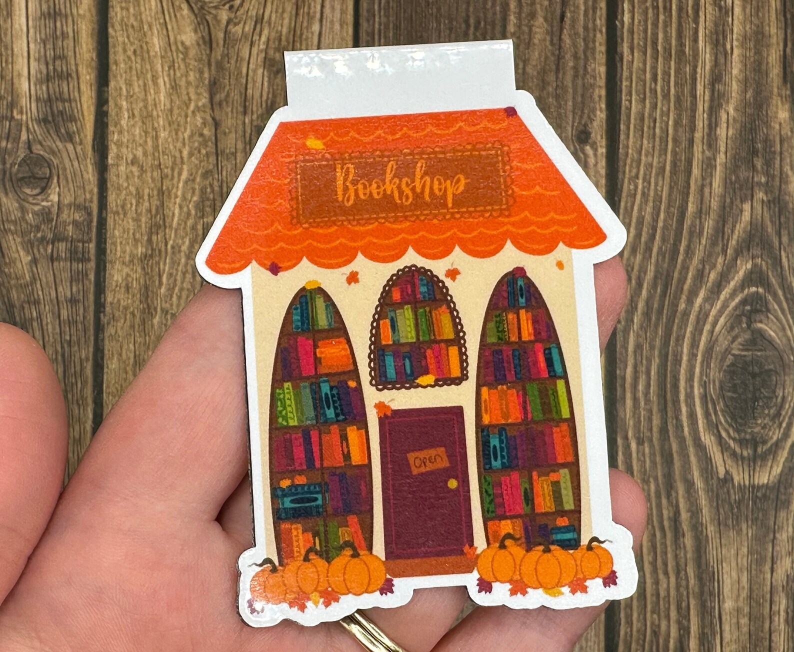 bookmark featuring a bookstore in fall colors