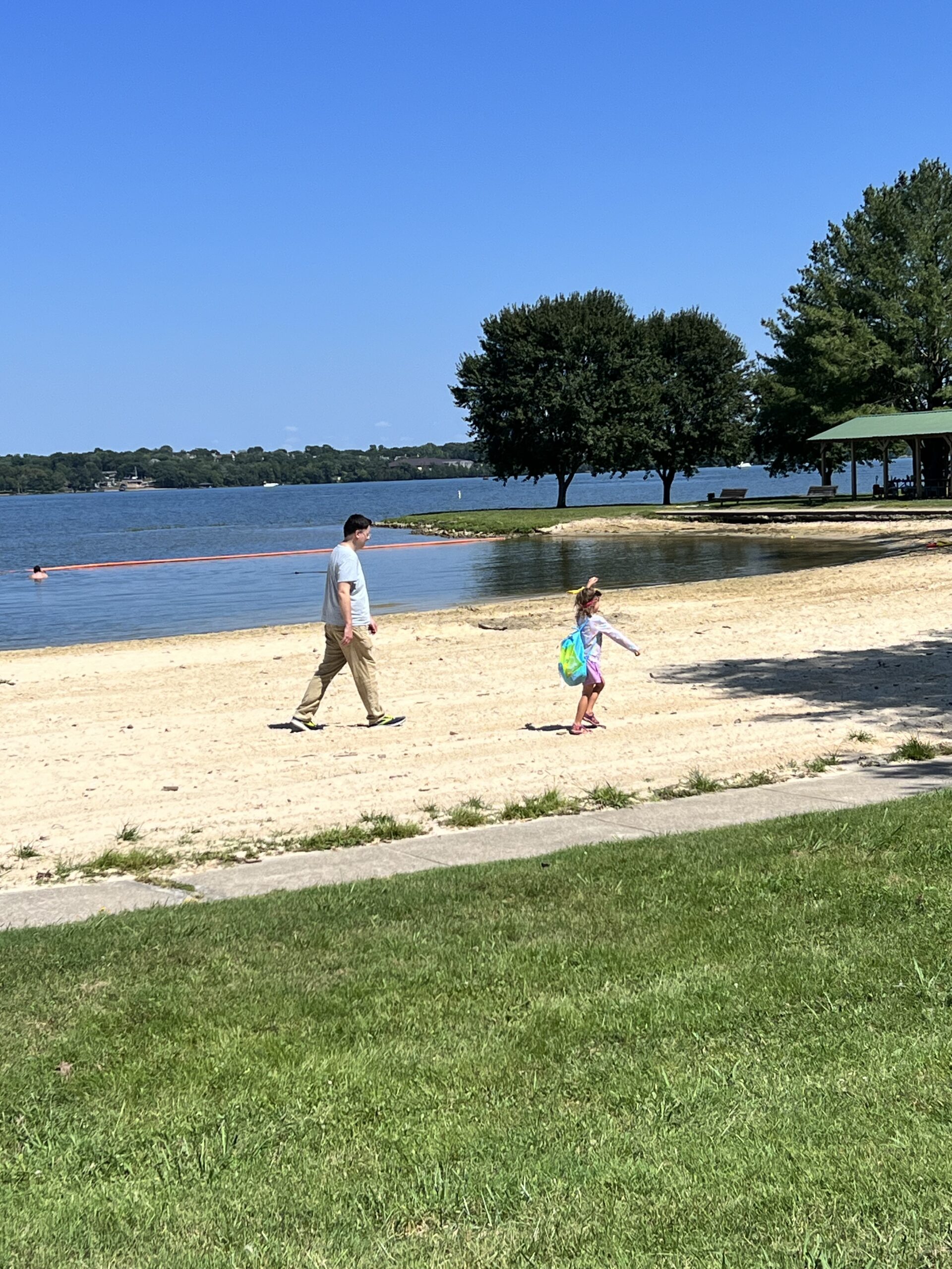 Marian and Ryan at a lake beach, the kids are all right