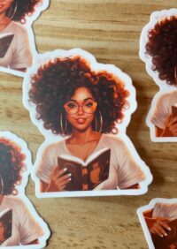 picture of sticker of Smiling Black woman reading