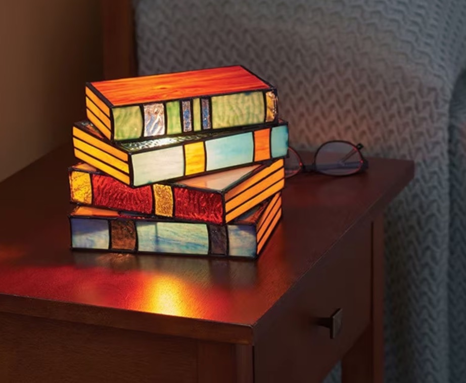 image of a stained glass lamp that looks like a stack of books