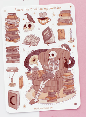 sticker sheet of book stacks and books with a skeleton sitting in a chair reading