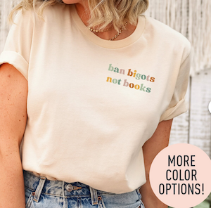 cream colored tshirt with graphic text on breast saying "ban bigots not books"