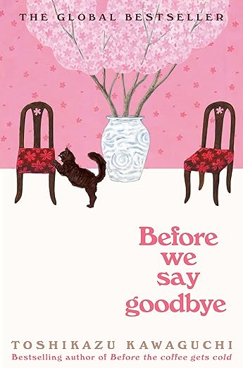 cover of Before We Say Goodbye (Before the Coffee Gets Cold Series) by Toshikazu Kawaguchi; illustration of two dining room chairs with red cushions, a black cat, and a large vase of cherry blossoms