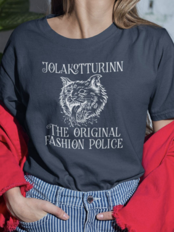 a photo of a shirt with a cat-like creature hissing and the text Jolakotturinn: the original fashion police
