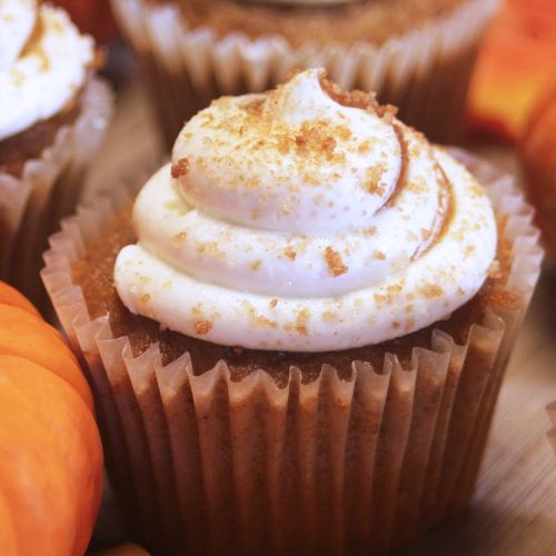 Pumpkin muffins with cream cheese frosting