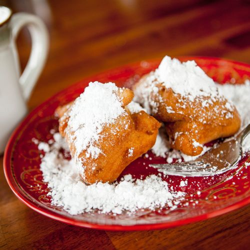 beignets on a red plate