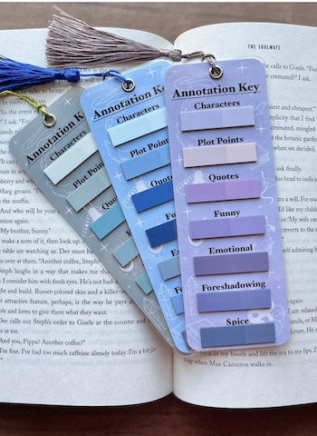 a photo of a set of bookmarks labelled "Annotation key" with stacks of small sticky tabs in a match color palette, all labelled things like "Character" and "Plot"