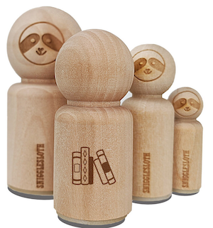 a wood carved rubber stamp of books shaped like a sloth