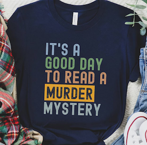 a navy tshirt with block letting in different colors that says "It's a good day to read a murder mystery"