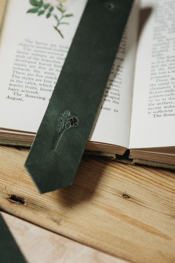 Green leather bookmark with embossed wildflower bouquet