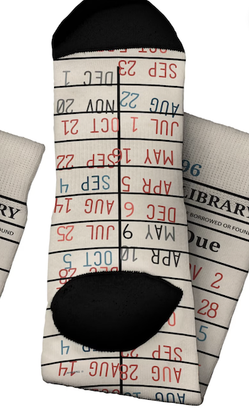 Picture of socks printed with library-style due dates in different colors