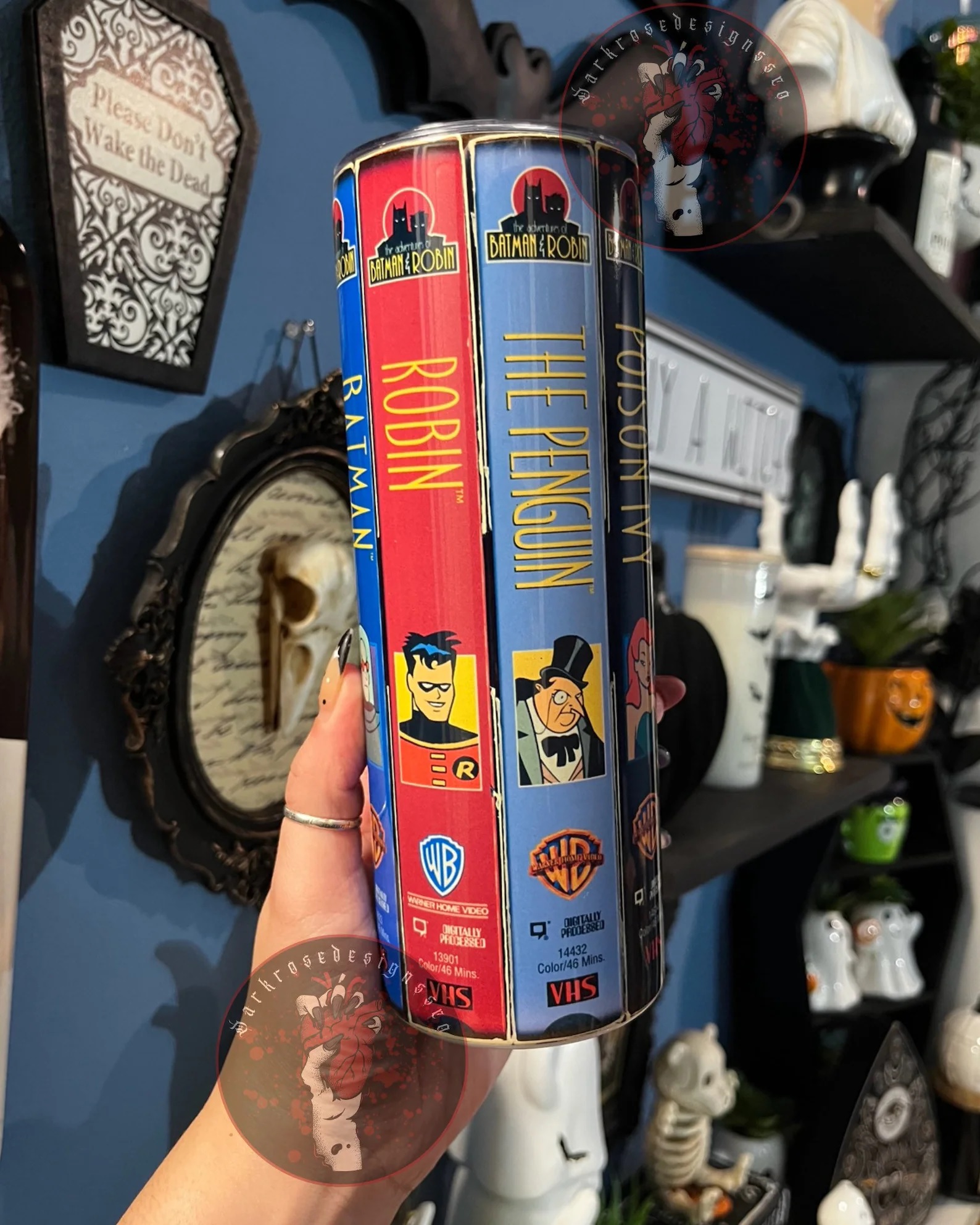 A tumbler made with the sides of VHS covers from Batman: The Animated Series