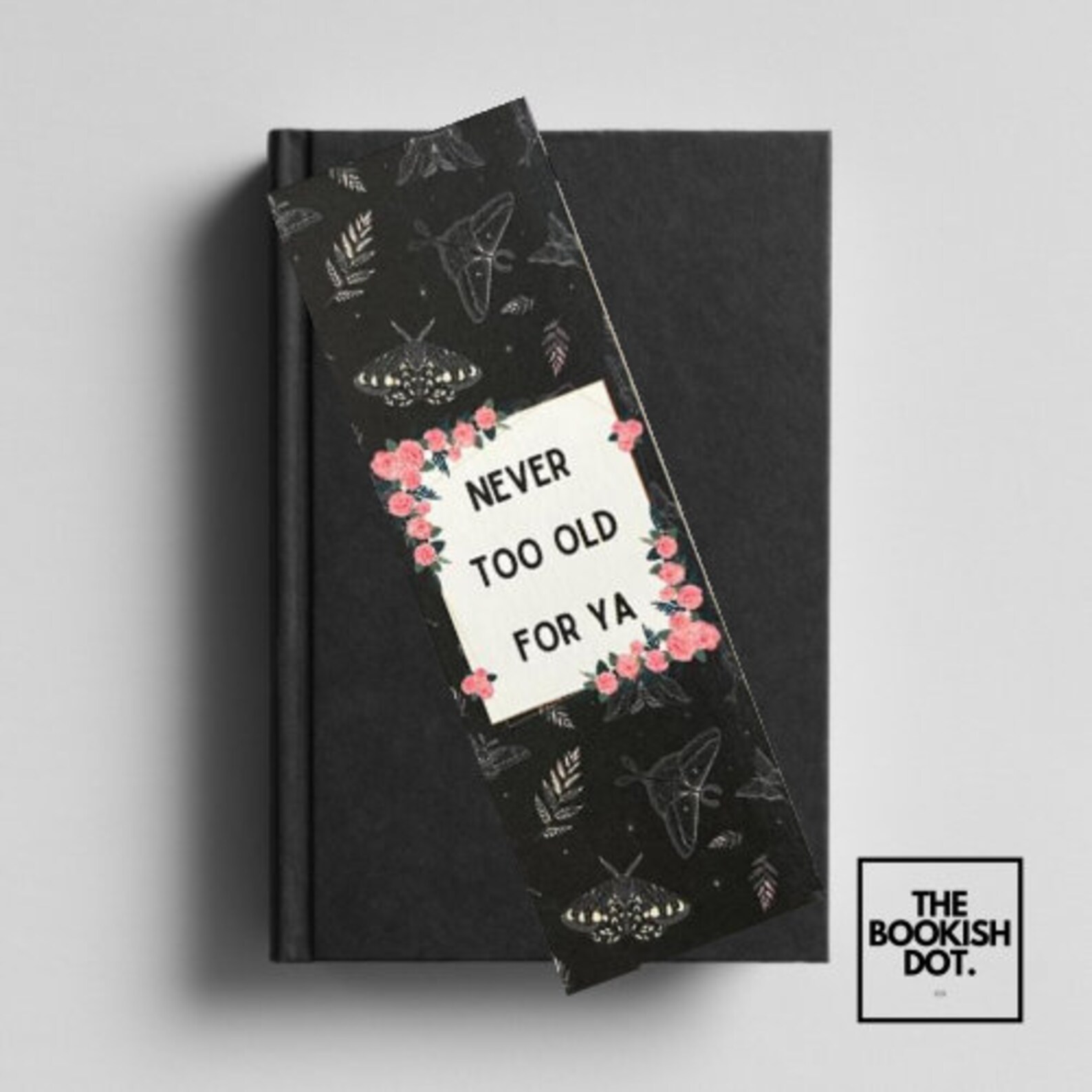 image of a black bookmark that says never too old for ya